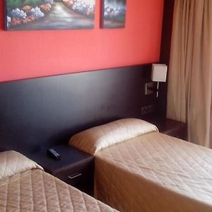 Habitación con 2 Camas Individuales